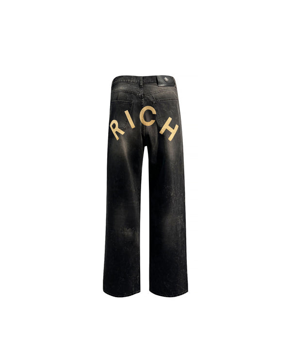 Jeans regular con lacerazione in nero e personalizzazione "RICH" glitter gold