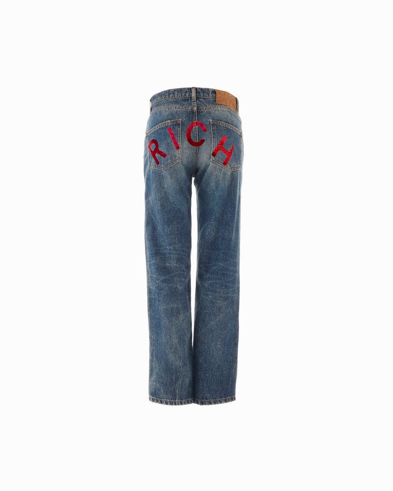 Jeans slim straight in denim in blu con personalizzazione "RICH" metal red