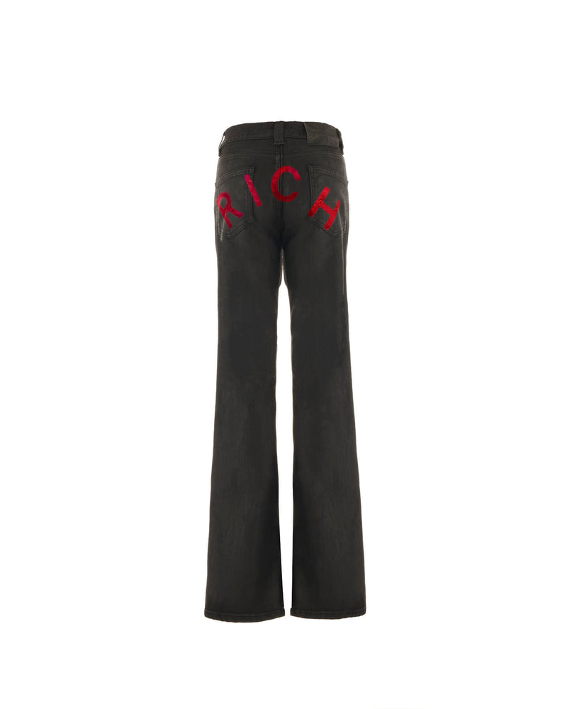 Jeans flare in denim nero con personalizzazione "RICH" metal red