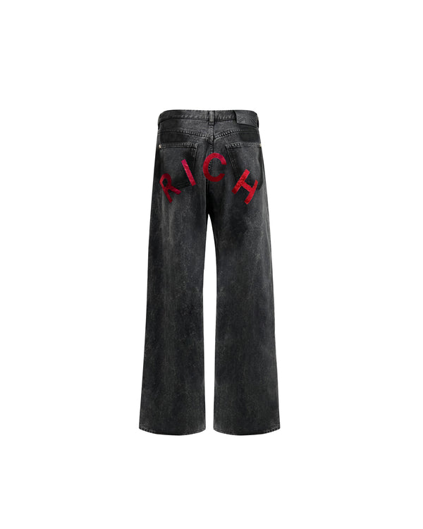 Jeans super baggy in denim nero con personalizzazione "RICH" metal red