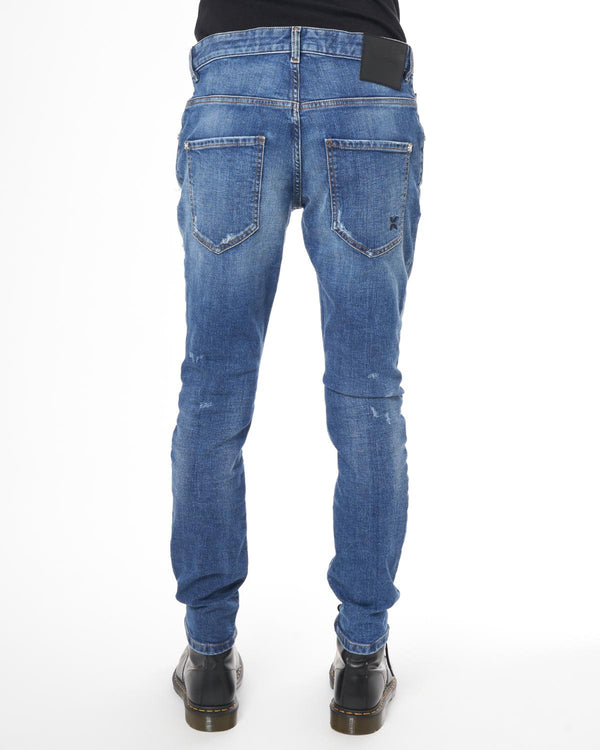 Slim fit jeans with lacerations