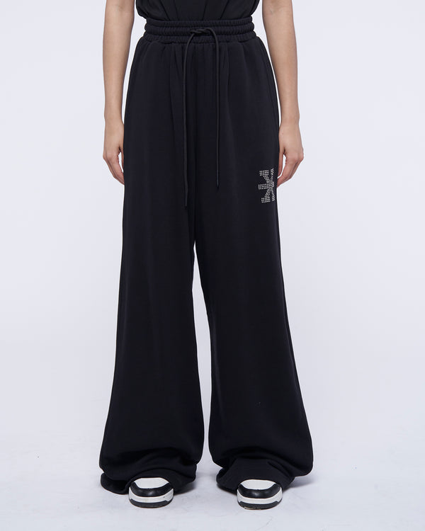 Pantaloni wide leg in tuta