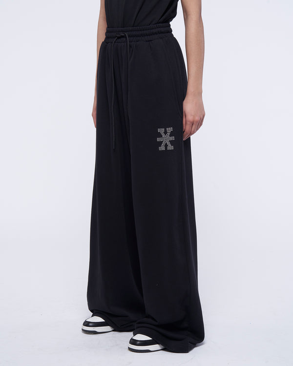 Pantaloni wide leg in tuta