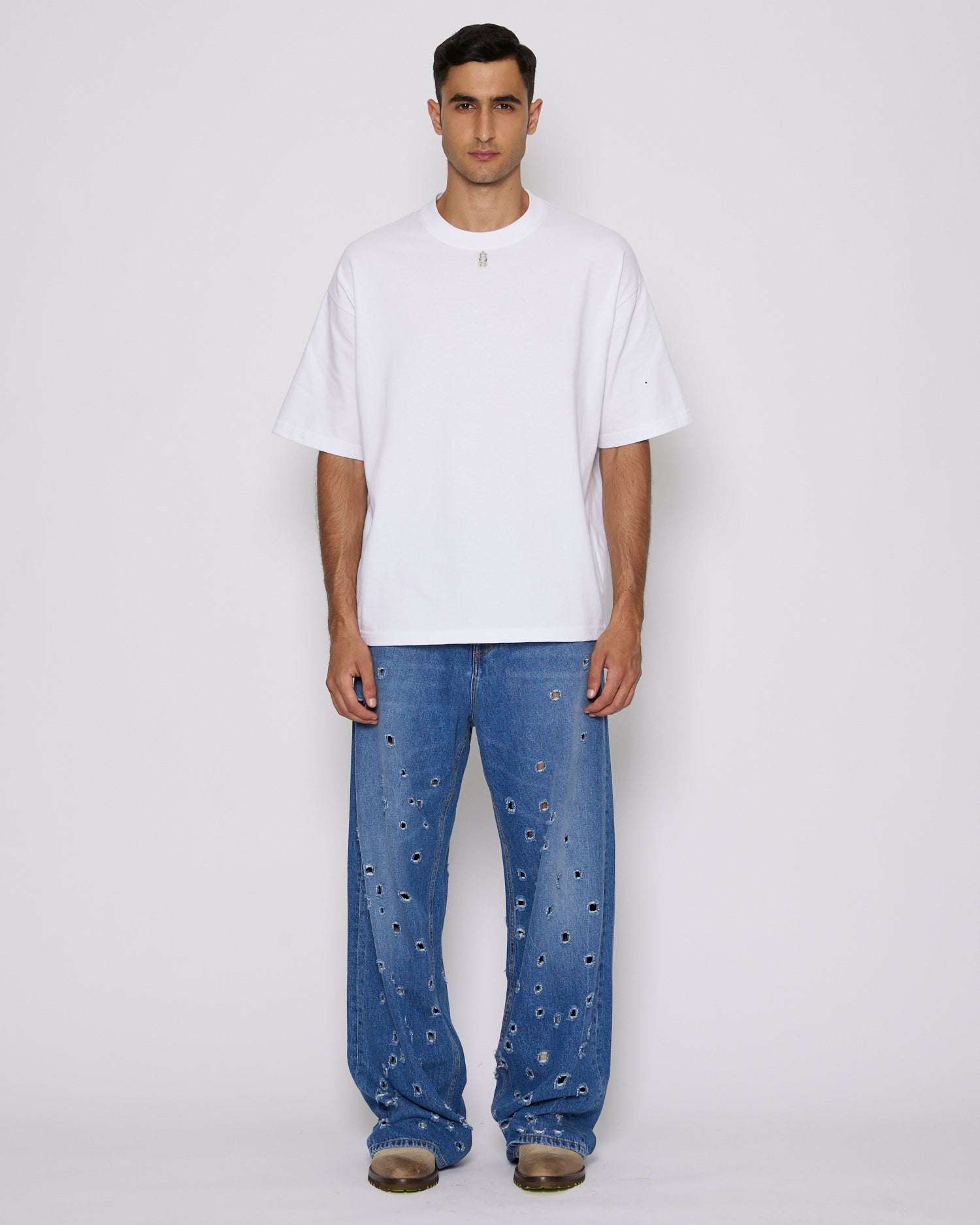 John Richmond Jeans gamba larga con fori metallici sul davanti