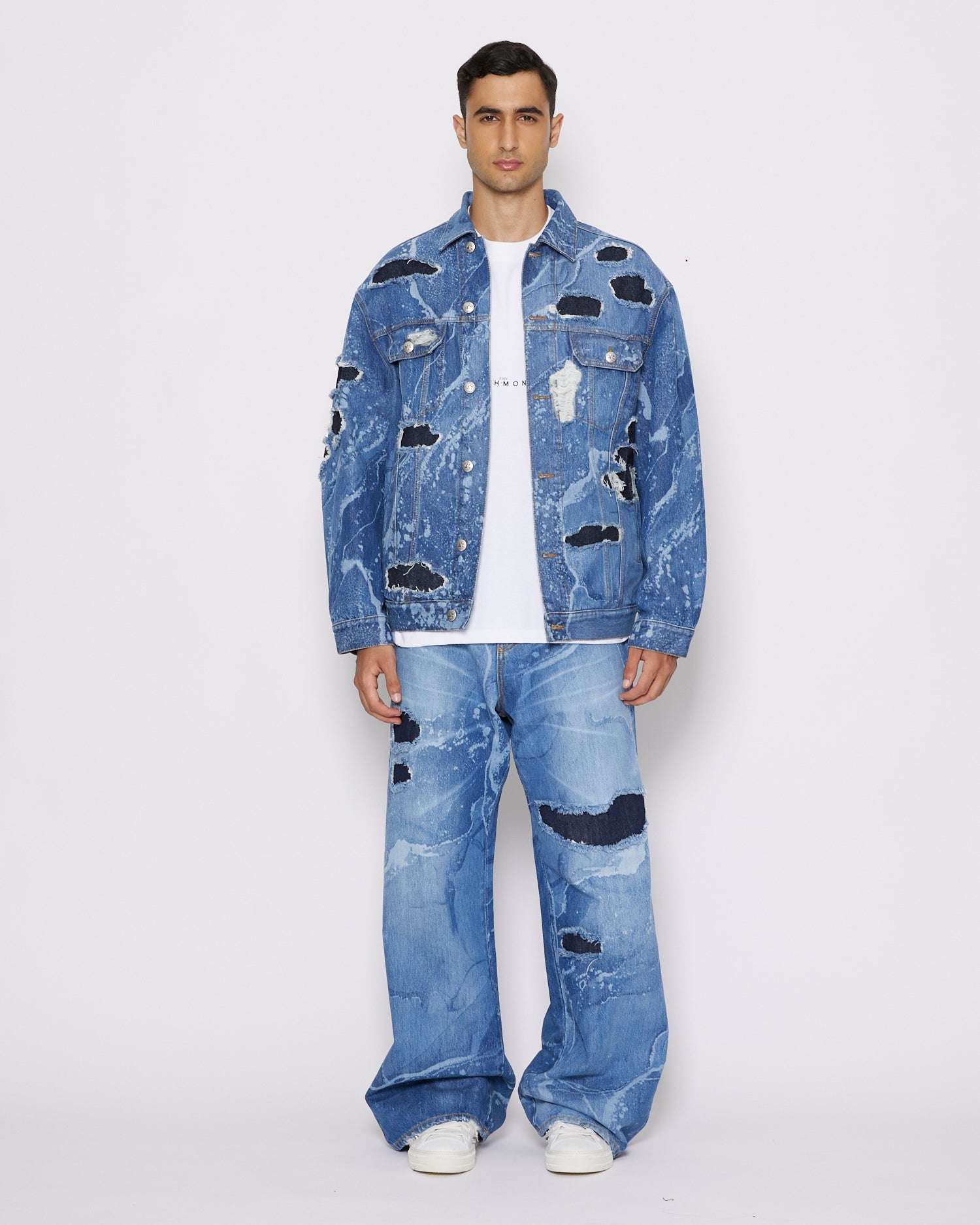 John Richmond Jeans gamba larga con strappi sul davanti