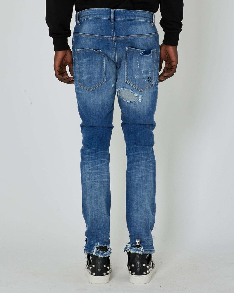 Slim jeans with rips in the front