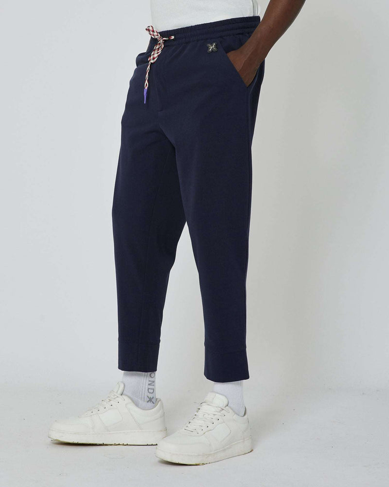 Pantalon de jogging avec logo en métal sur le devant